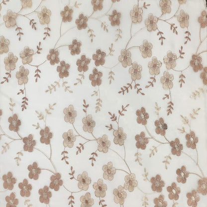 Delicate Blossoms on Sheer Fabric: Golden Floral Embroidery Pattern