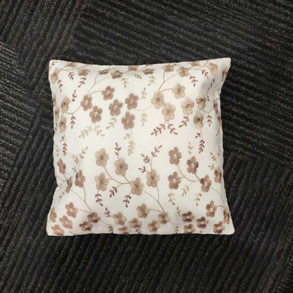 Delicate Blossoms on Sheer Fabric: Golden Floral Embroidery Pattern