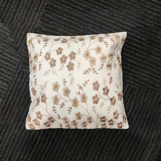 Delicate Blossoms on Sheer Fabric: Golden Floral Embroidery Pattern